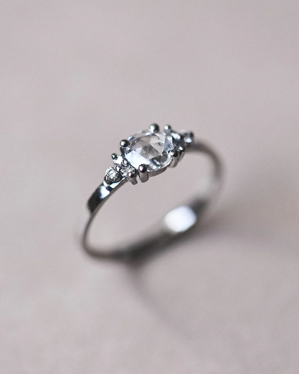  Front view of handmade platinum ring with rose-cut centre diamond