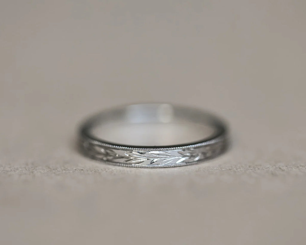 2mm olive leaf and milled edge flat court wedding ring in platinum