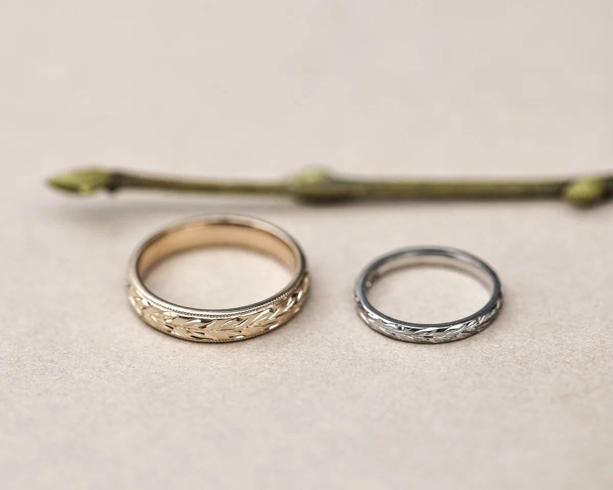 9ct yellow gold olive leaf wedding ring paired with white gold band