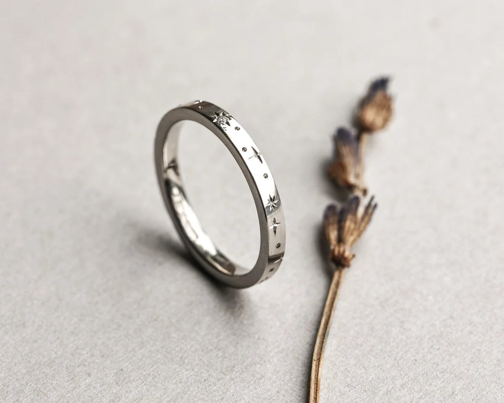 star engraving setting detail platinum wedding ring