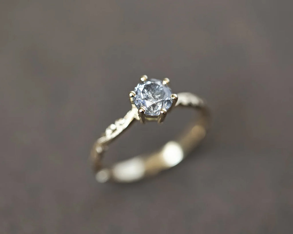 Front view of handmade yellow gold salt and pepper diamond ring