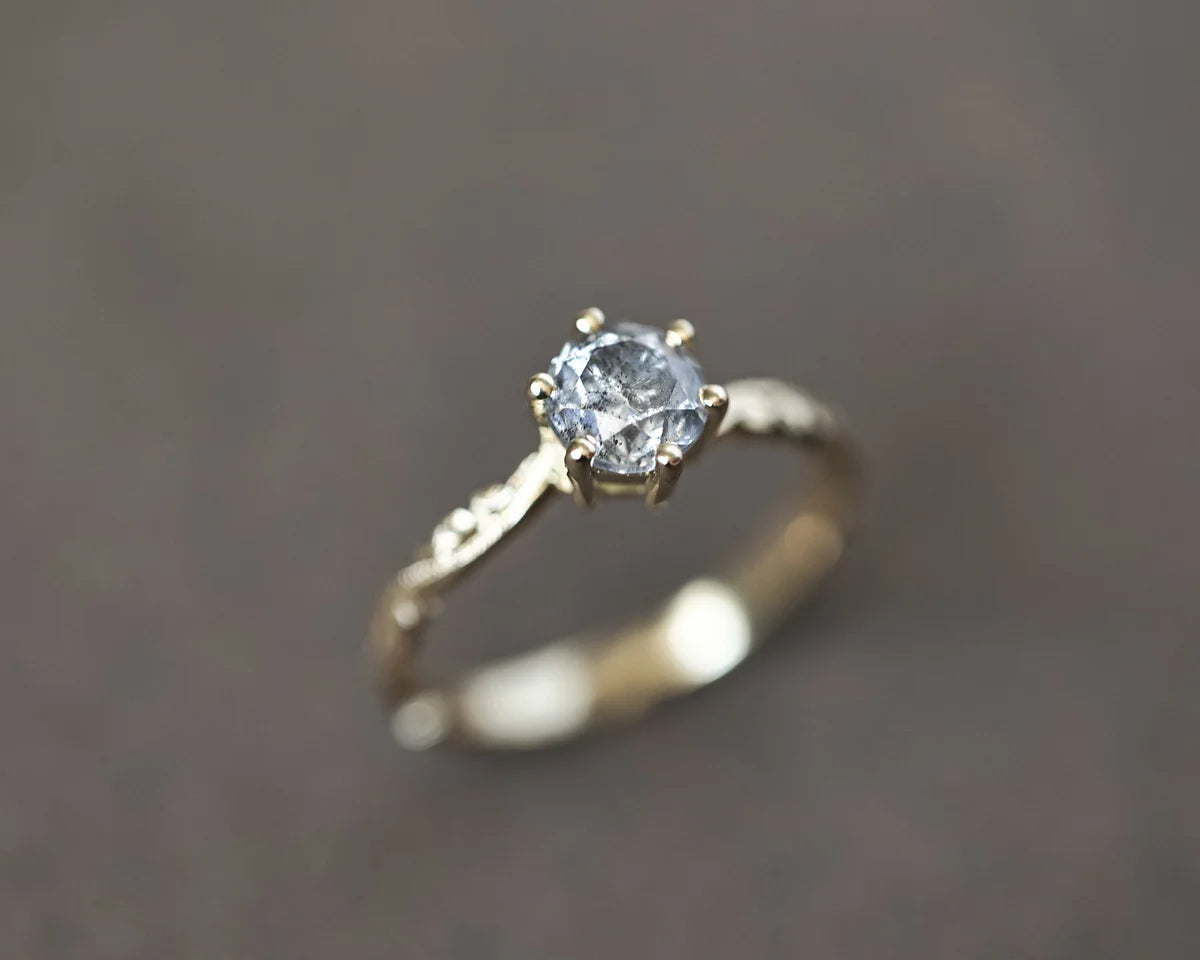 Front view of handmade yellow gold salt and pepper diamond ring