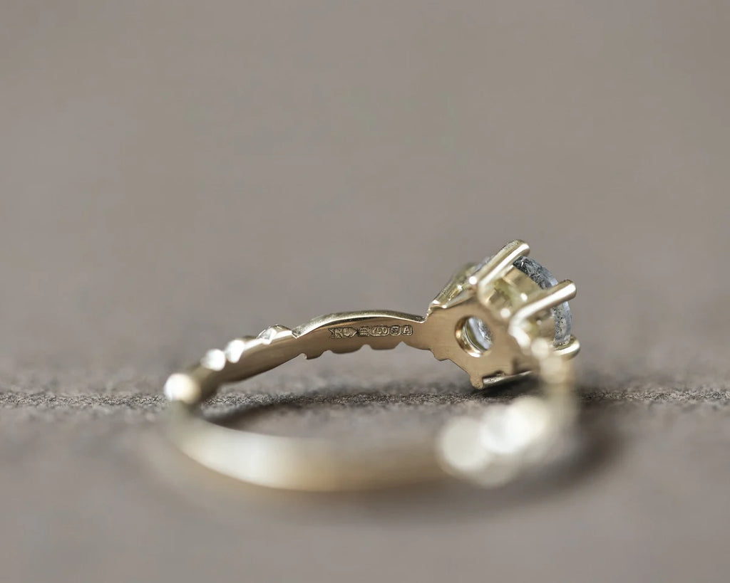 Back view of 18ct yellow gold diamond ring with claw setting