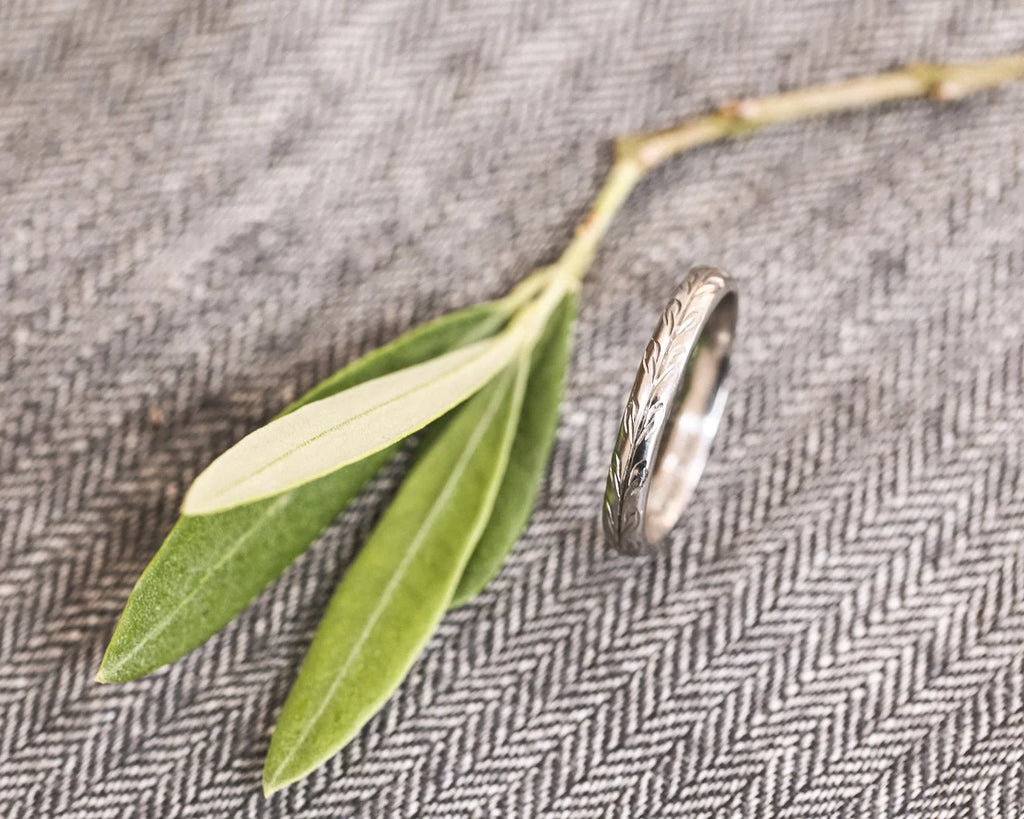 Handmade platinum olive leaf engraved ring with natural styling