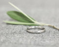 side view 3mm platinum band olive leaf engraved detail