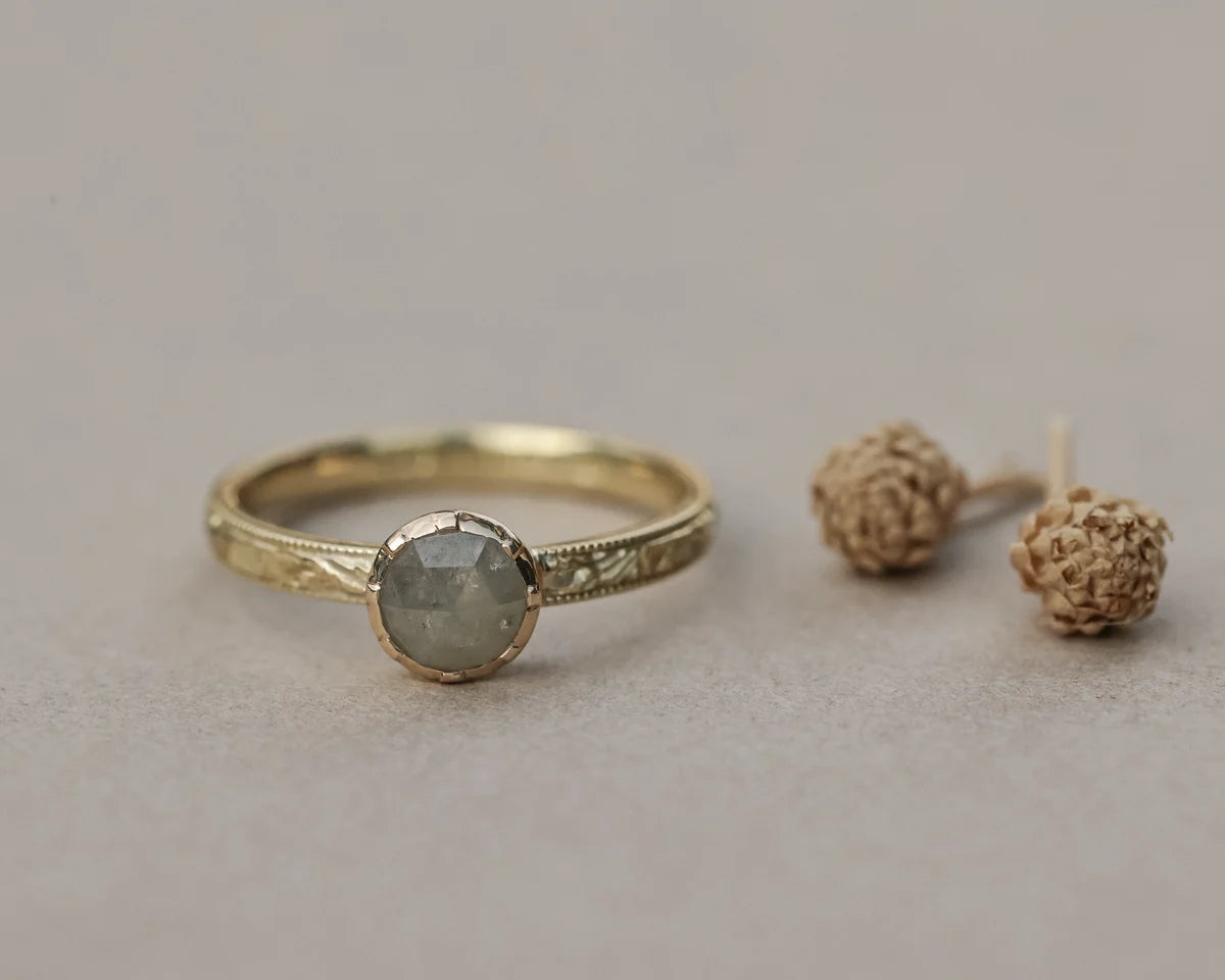 ront view of 18ct yellow gold ring with pale grey rose-cut diamond