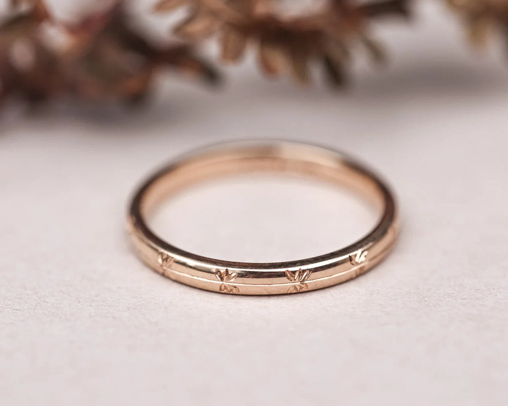 engraved wedding ring worn on hand rose gold 2mm band