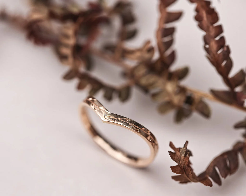 pressed flower engraving detail wishbone wedding ring rose gold
