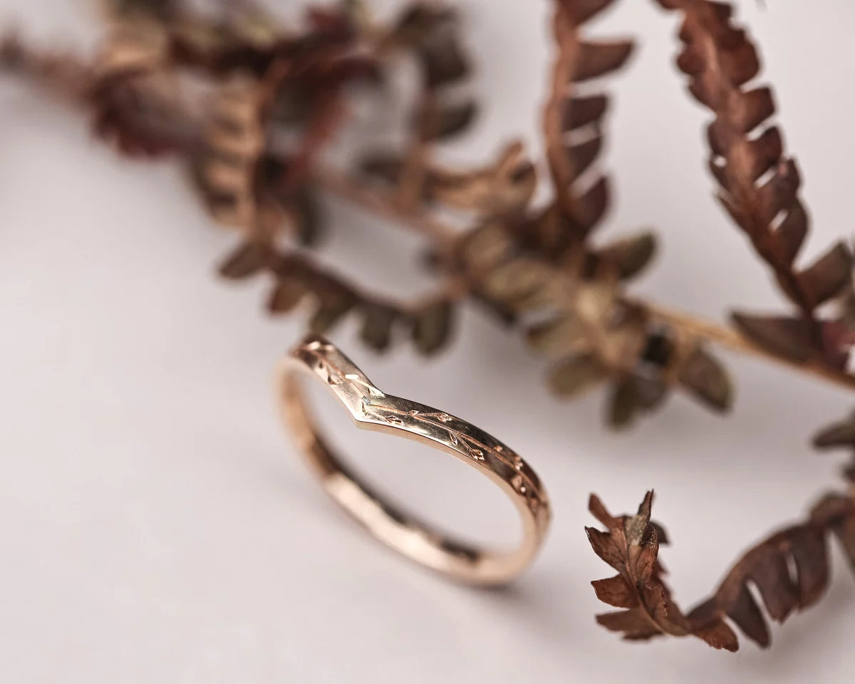 pressed flower engraving detail wishbone wedding ring rose gold