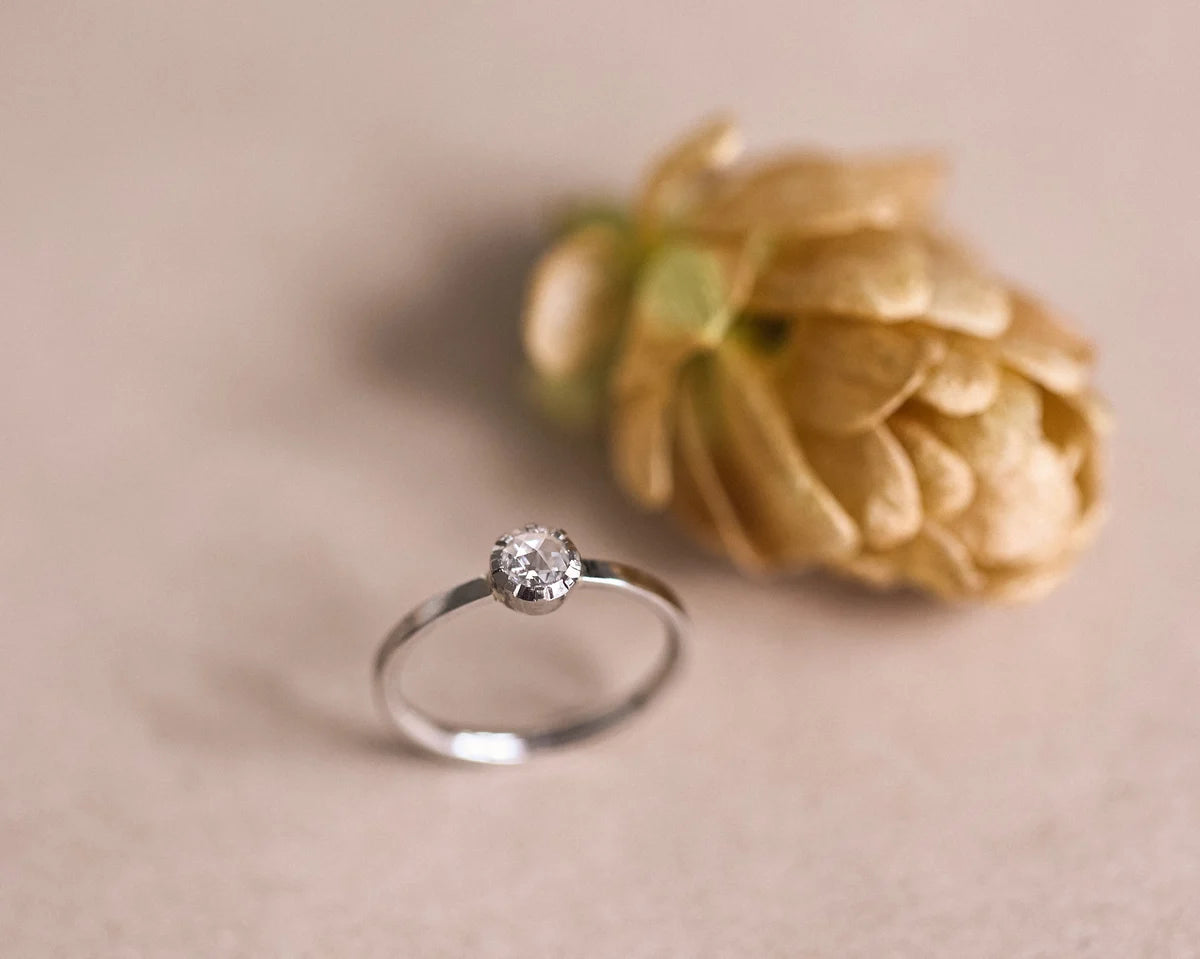 Minimal platinum ring with 4mm rose-cut white diamond