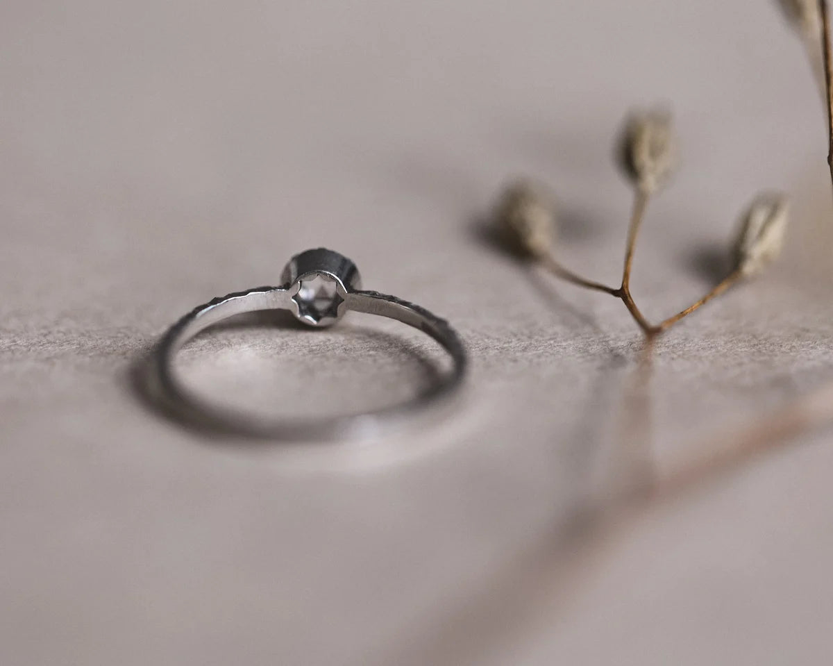 Front view of handmade platinum rose-cut diamond ring