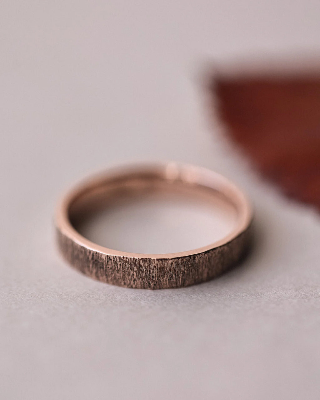 Minimal 9ct rose gold horn texture wedding band