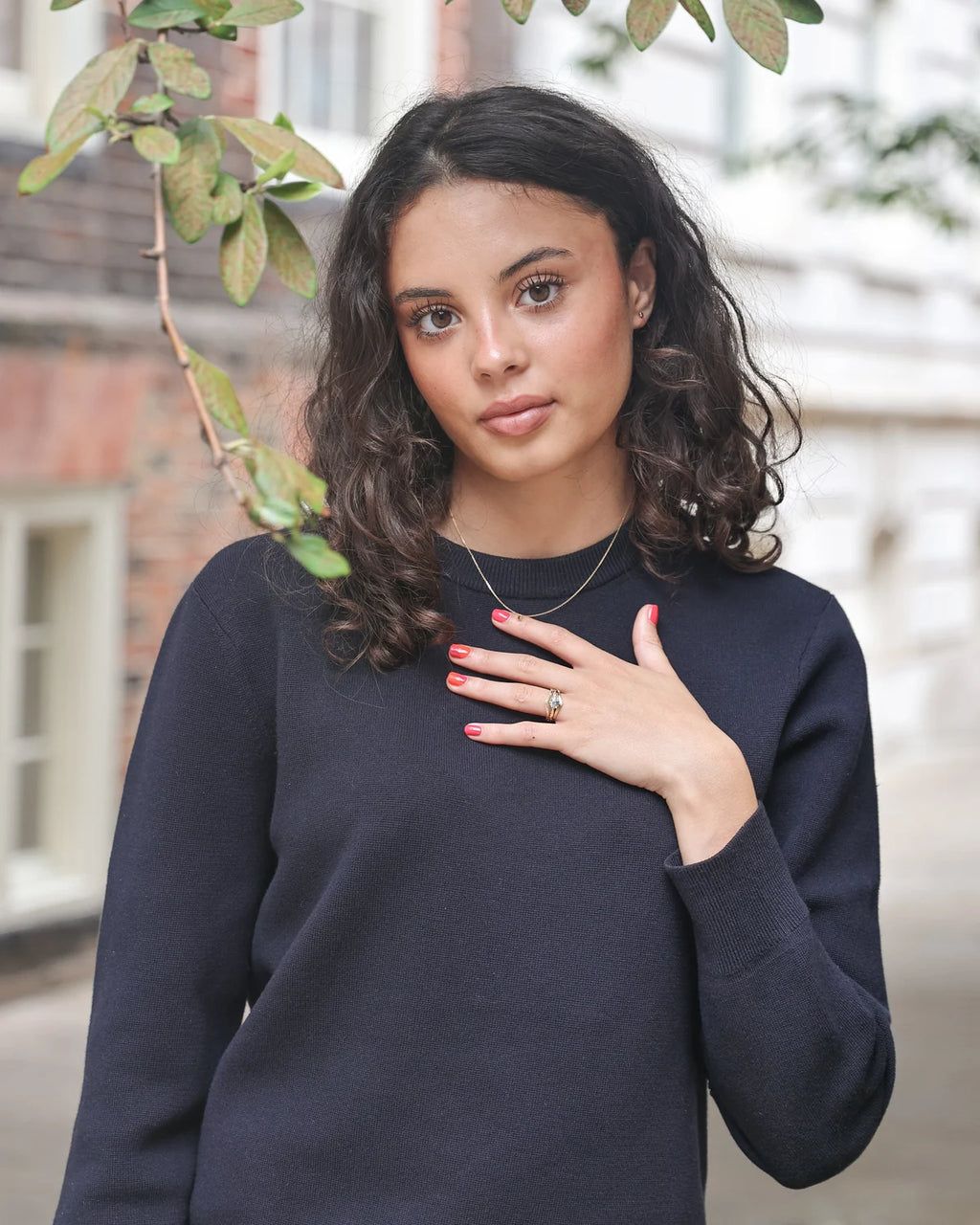 Editorial portrait wearing grey salt and pepper diamond ring