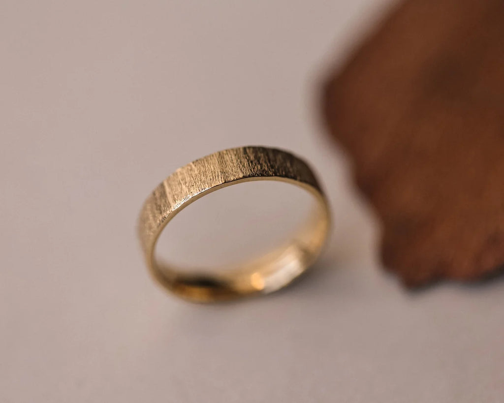 Minimal 18ct yellow gold horn texture wedding ring with organic finish