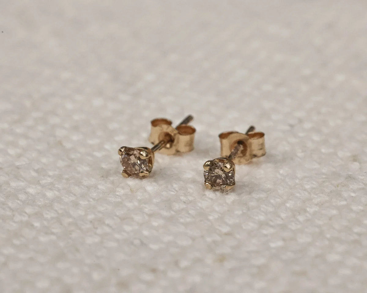 claw setting detail champagne diamond earrings 9ct gold