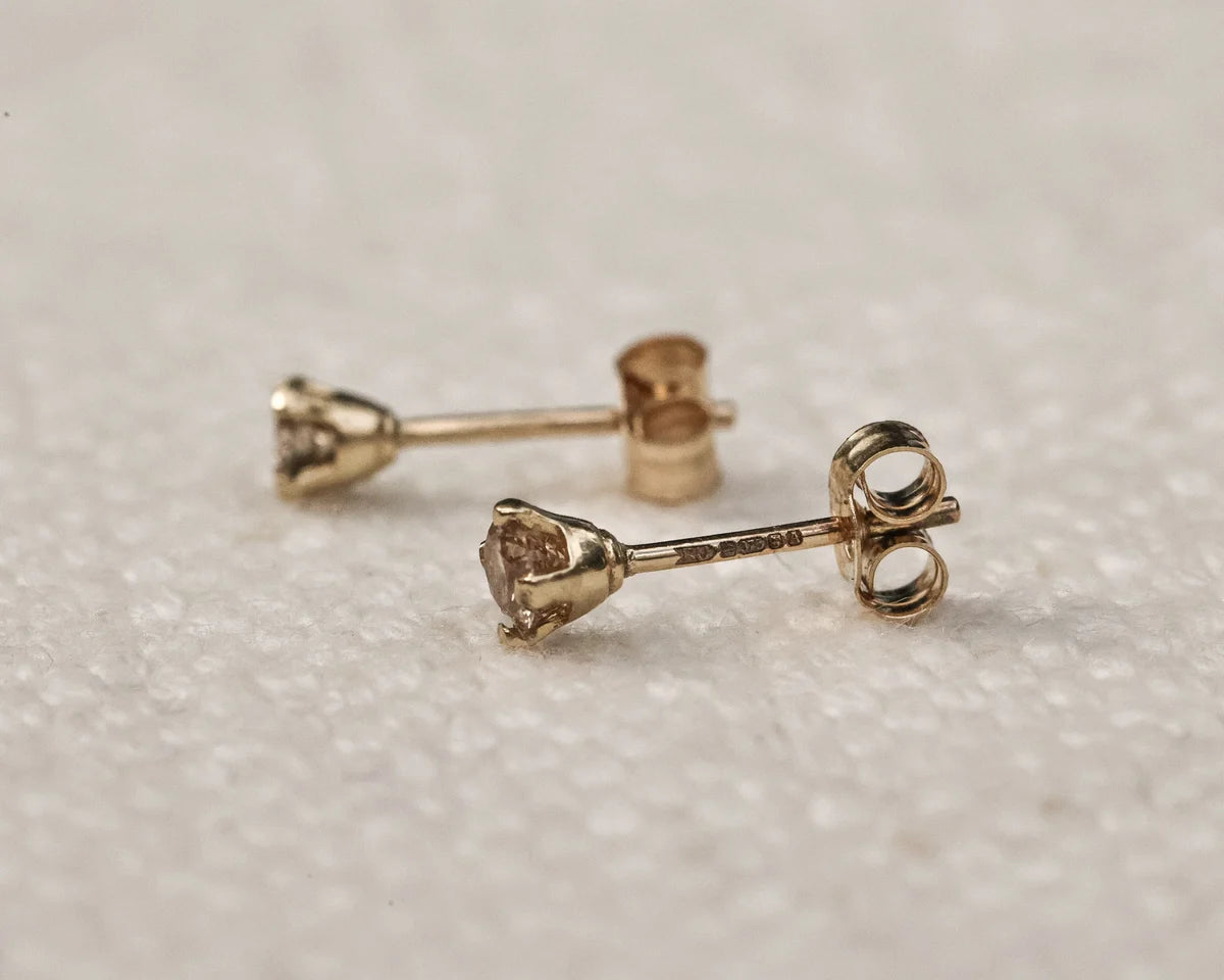 butterfly back detail gold diamond stud earrings