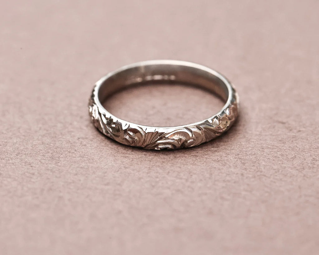 Front view of 18ct white gold floral engraved wedding ring