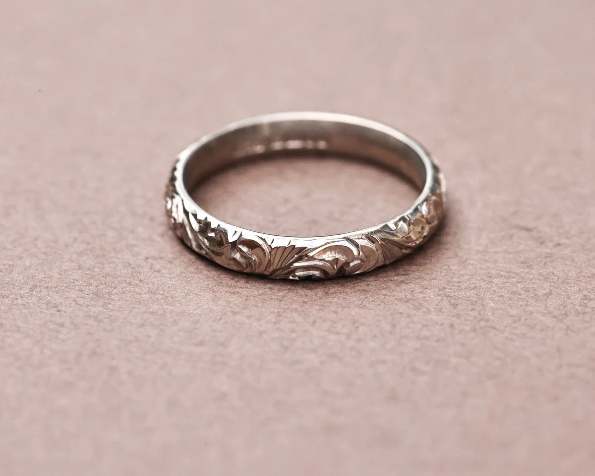 Front view of 18ct white gold floral engraved wedding ring