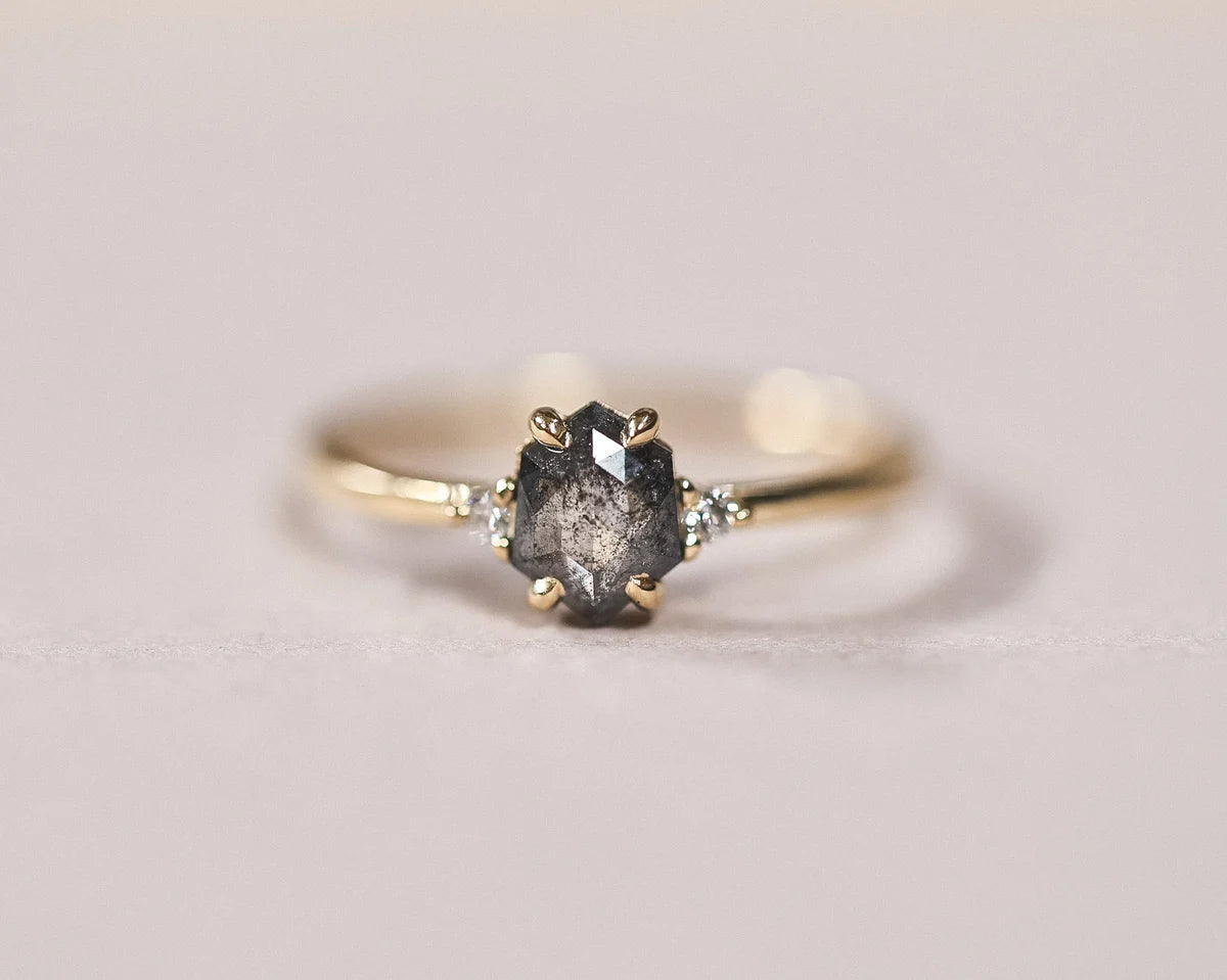 Front view of the 18ct yellow gold trilogy ring with grey rose-cut diamond