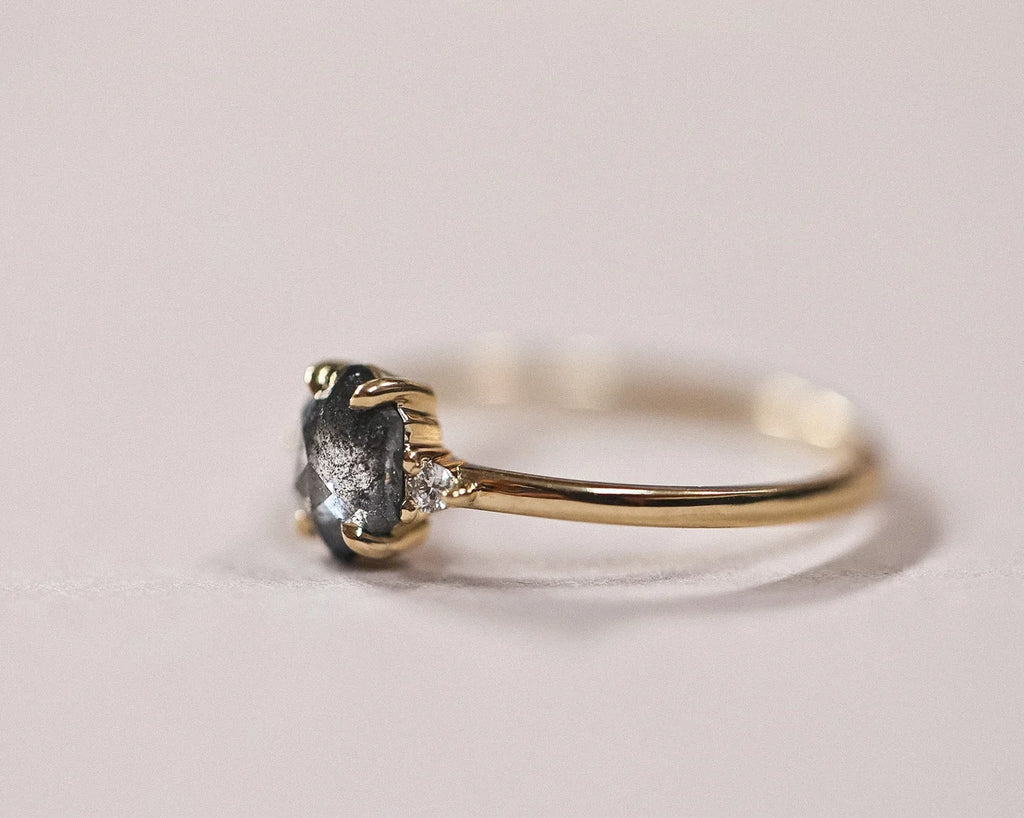 Profile view of the hexagonal grey rose-cut diamond ring in yellow gold
