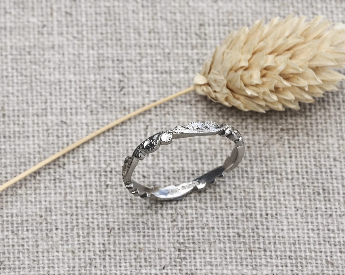 engraved floral pattern detail platinum band ring