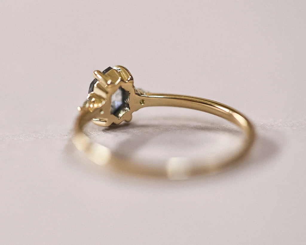 Back view of 18ct yellow gold trilogy ring showing setting detail