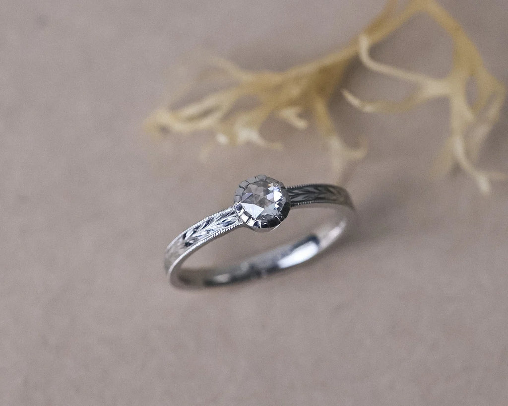 Botanical inspired platinum ring with rose-cut white diamond