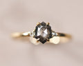 18ct yellow gold trilogy ring with grey rose-cut hexagonal diamond and white diamond shoulders