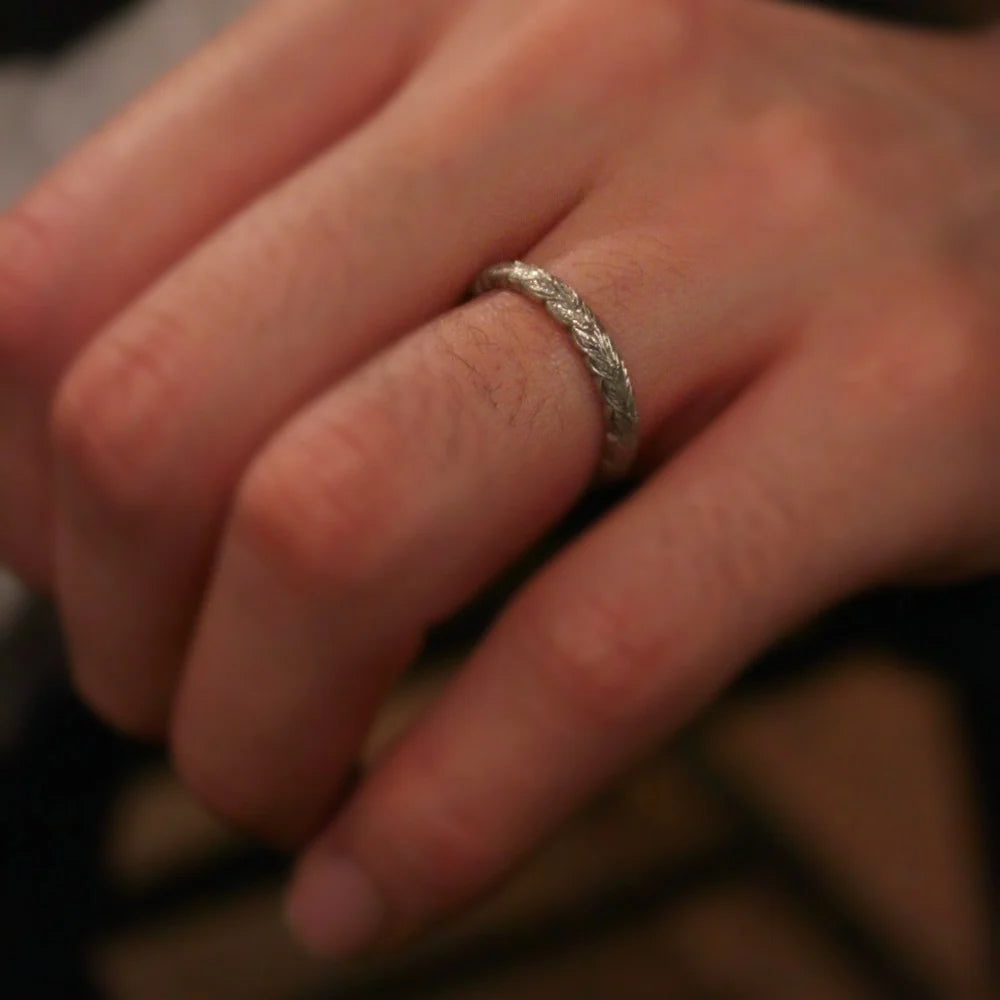 white gold wedding ring worn on hand 3mm carved leaf band
