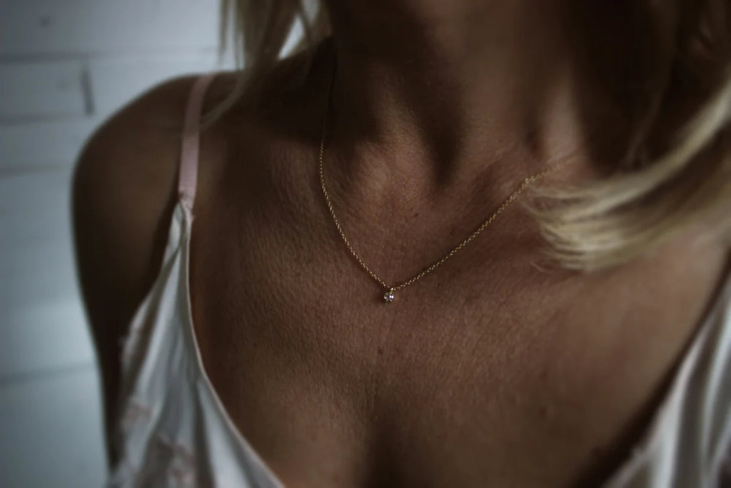 rose cut diamond necklace worn on neck 18ct gold