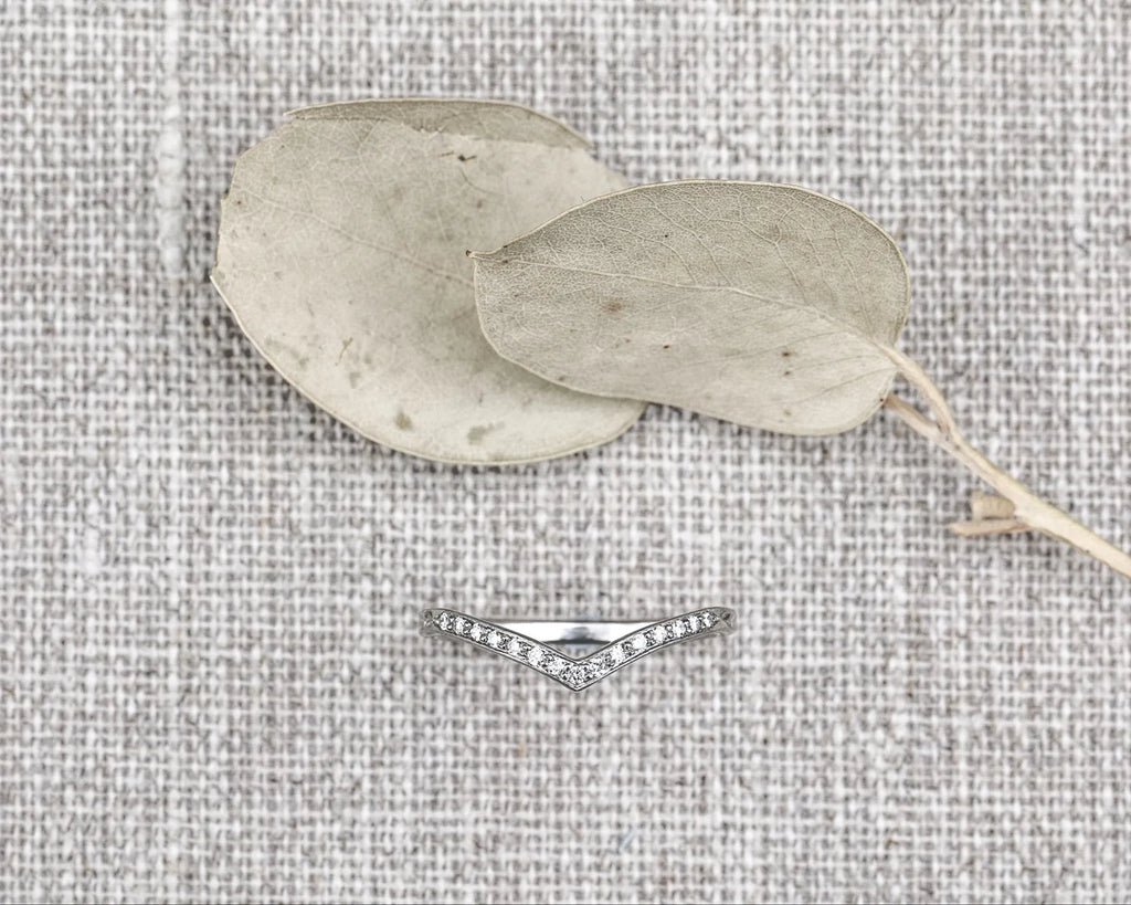 fine diamond setting detail platinum wishbone ring