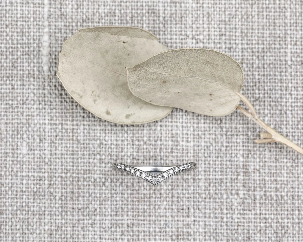 fine diamond setting detail platinum wishbone ring
