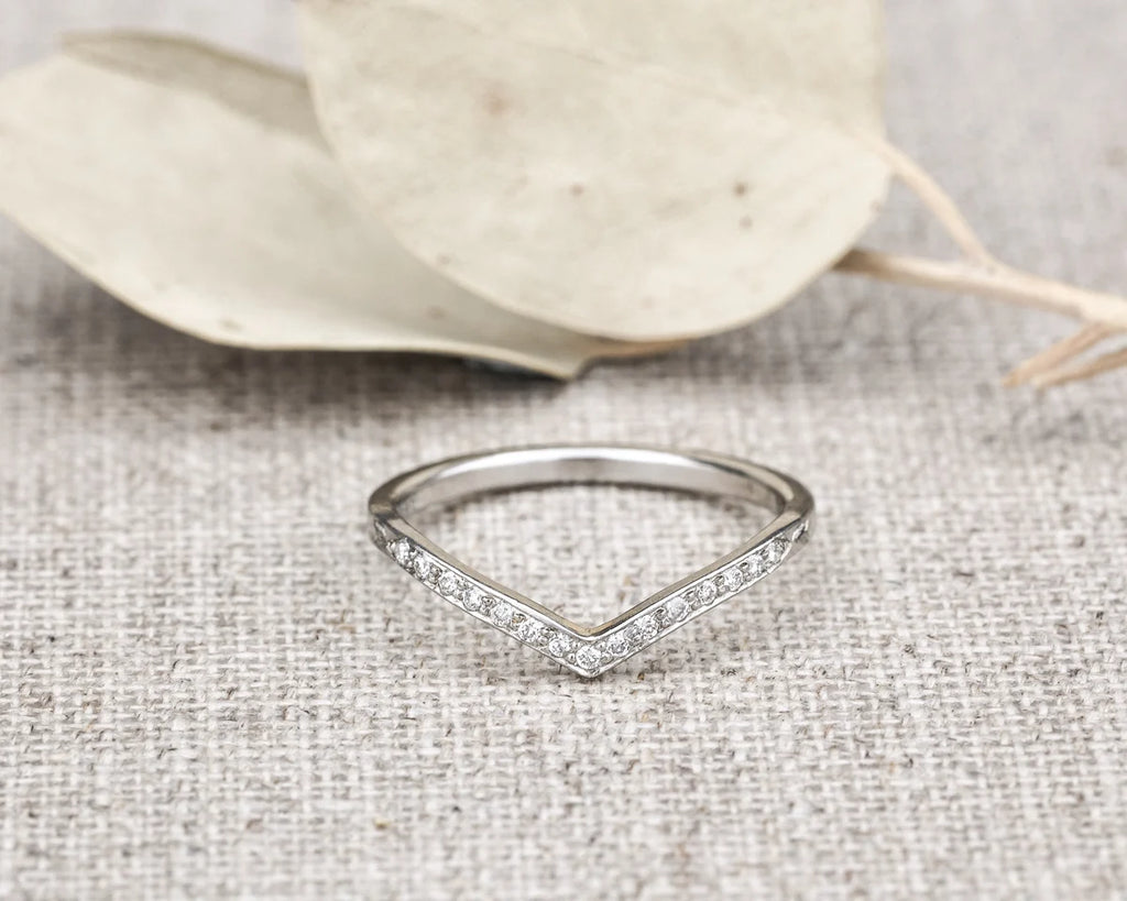 delicate diamond setting detail platinum ring