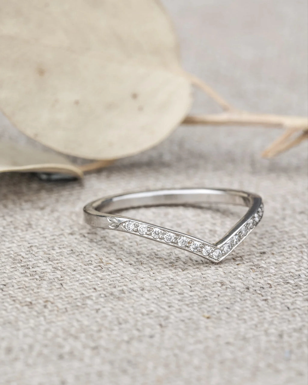 side view 1.5mm platinum diamond wishbone band slim profile